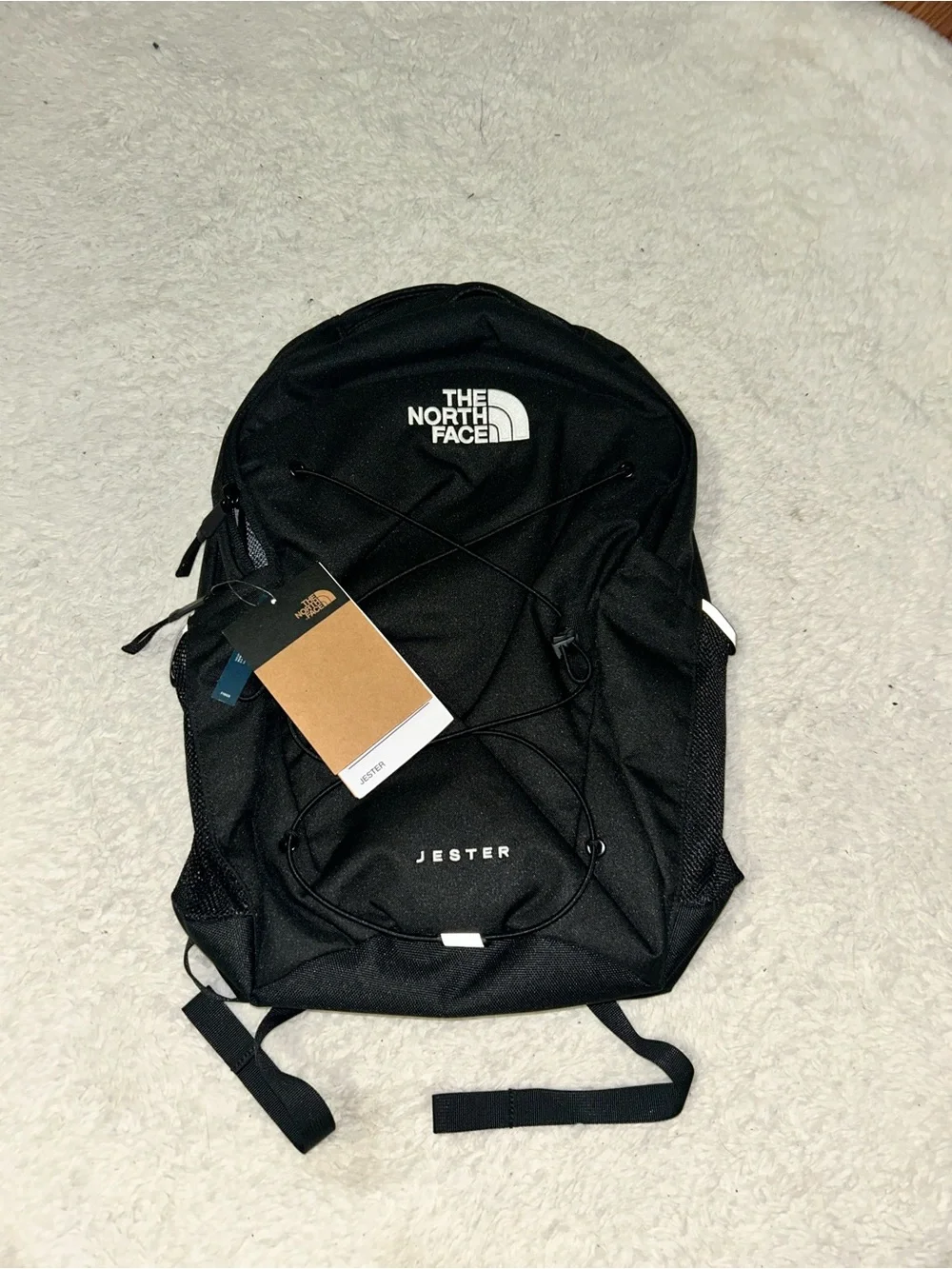 The North Face Jester Backpack in Black with White Logo